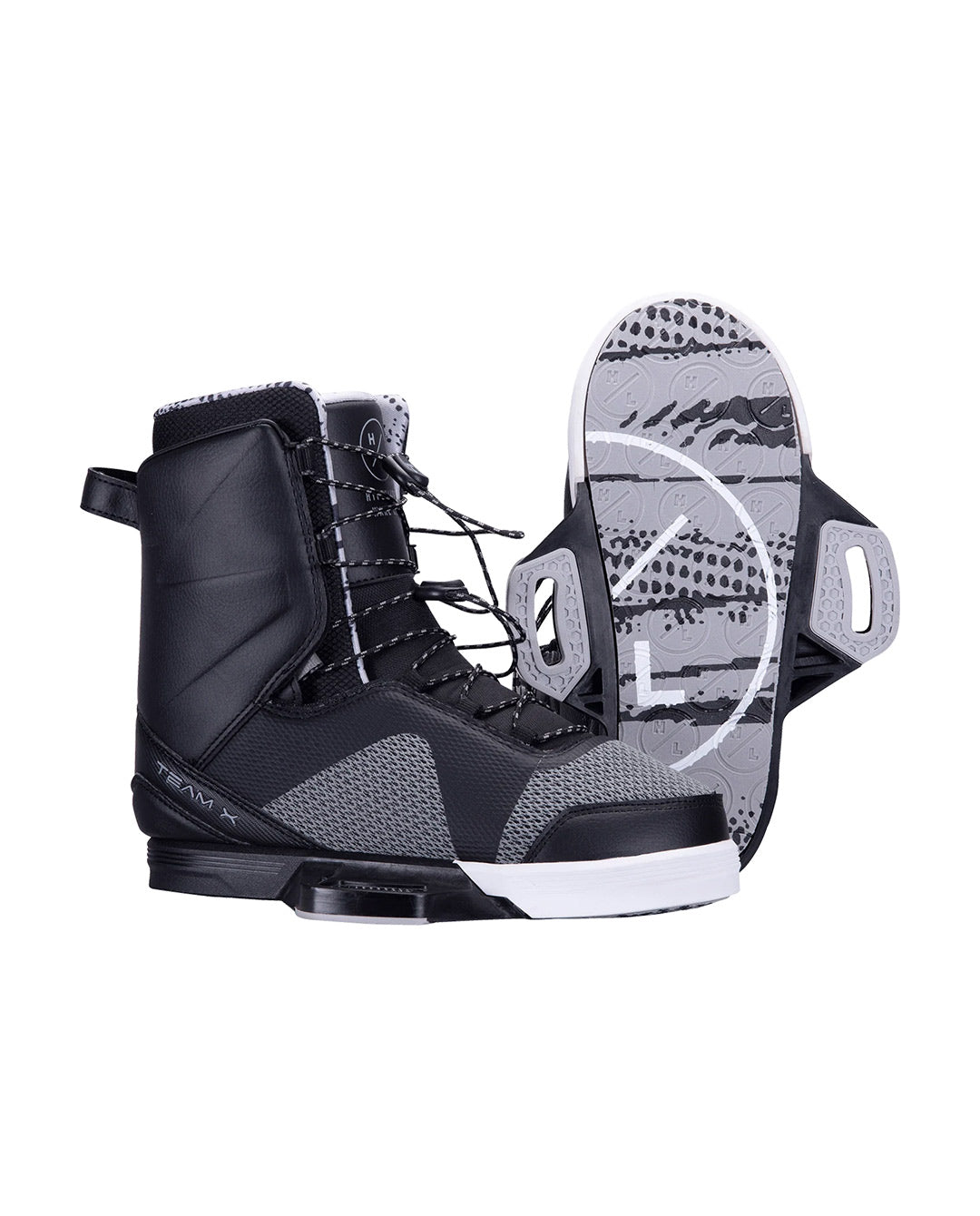Black and gray wakeboard boot with white sole on a white background